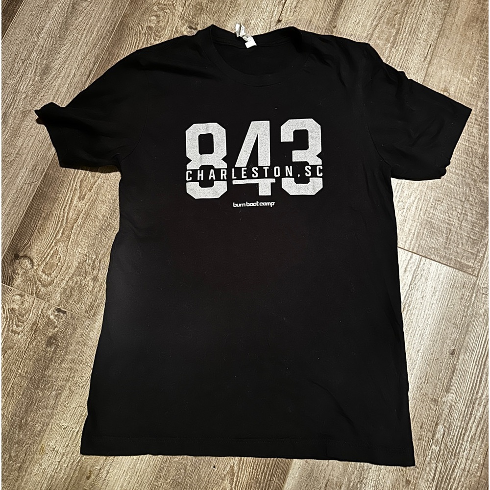 Burn Boot Camp Custom Tee, CHARCOAL IN COLOR, washed and laid to dry. Unisex